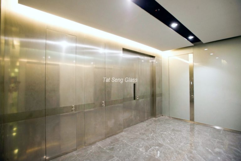 Tat-Seng-Glass-Asia-Square-Tower-Deco-Stainless-Steel-Cladding-to-Corridor-Riser-Door